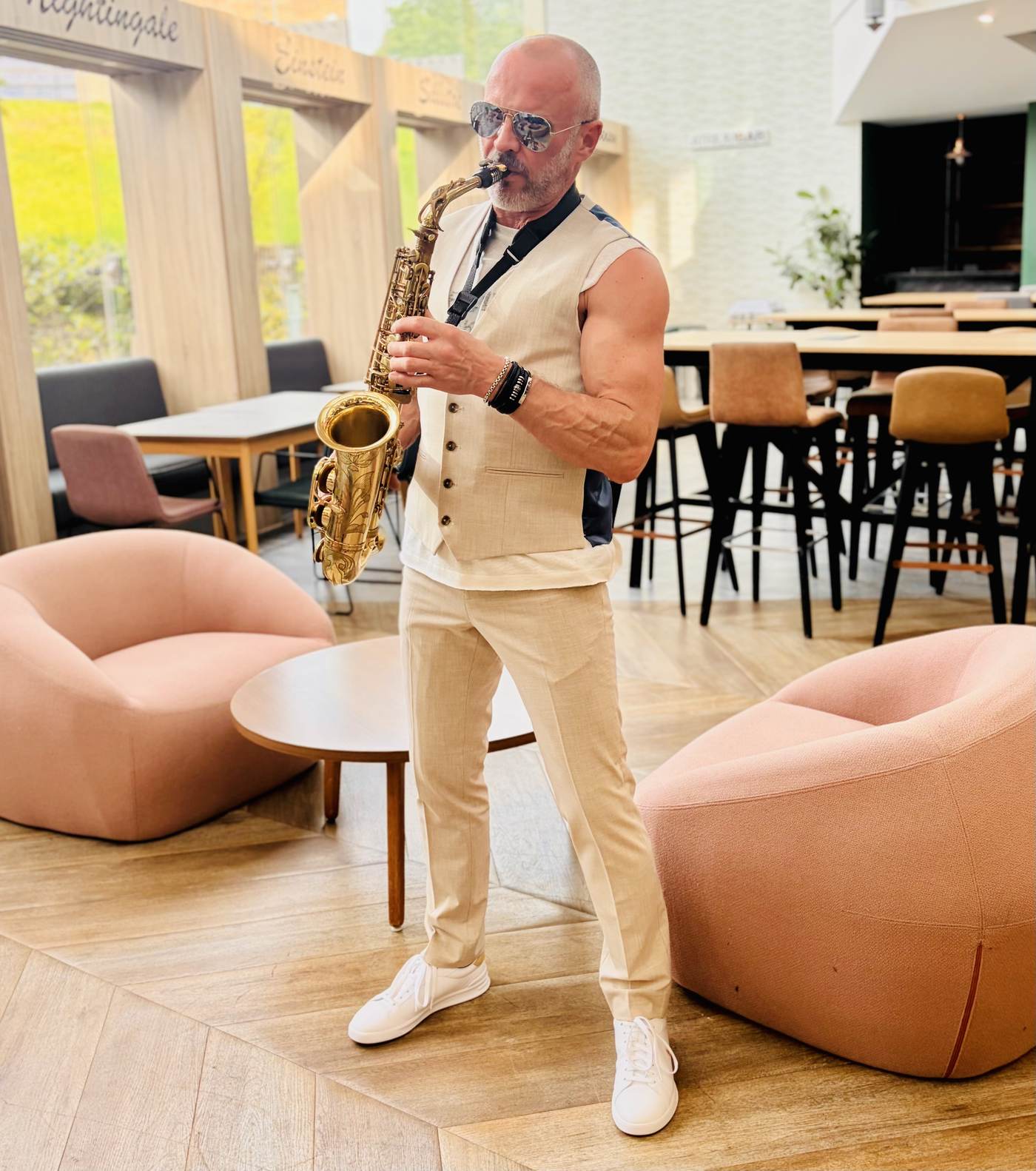 Paul Martyn playing saxophone live at a wedding venue
